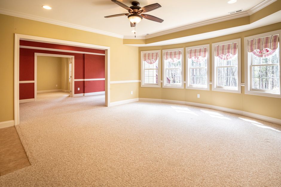 Clean residential living room with fresh carpet