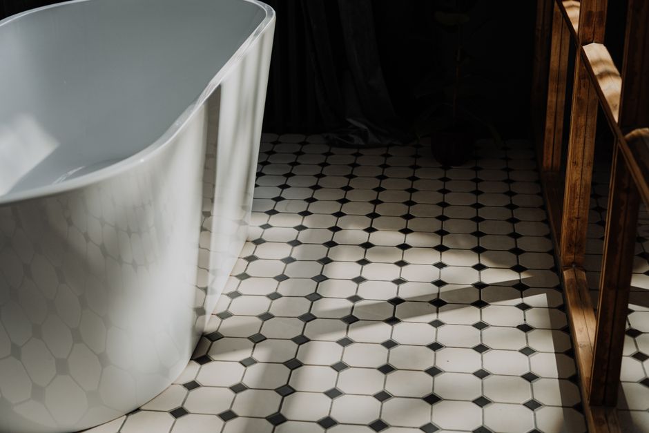 Clean tile floor with white and black tiles